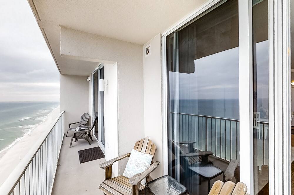 Serene beachfront condo w\/ gulf views & resort pools, hot tubs, beach service