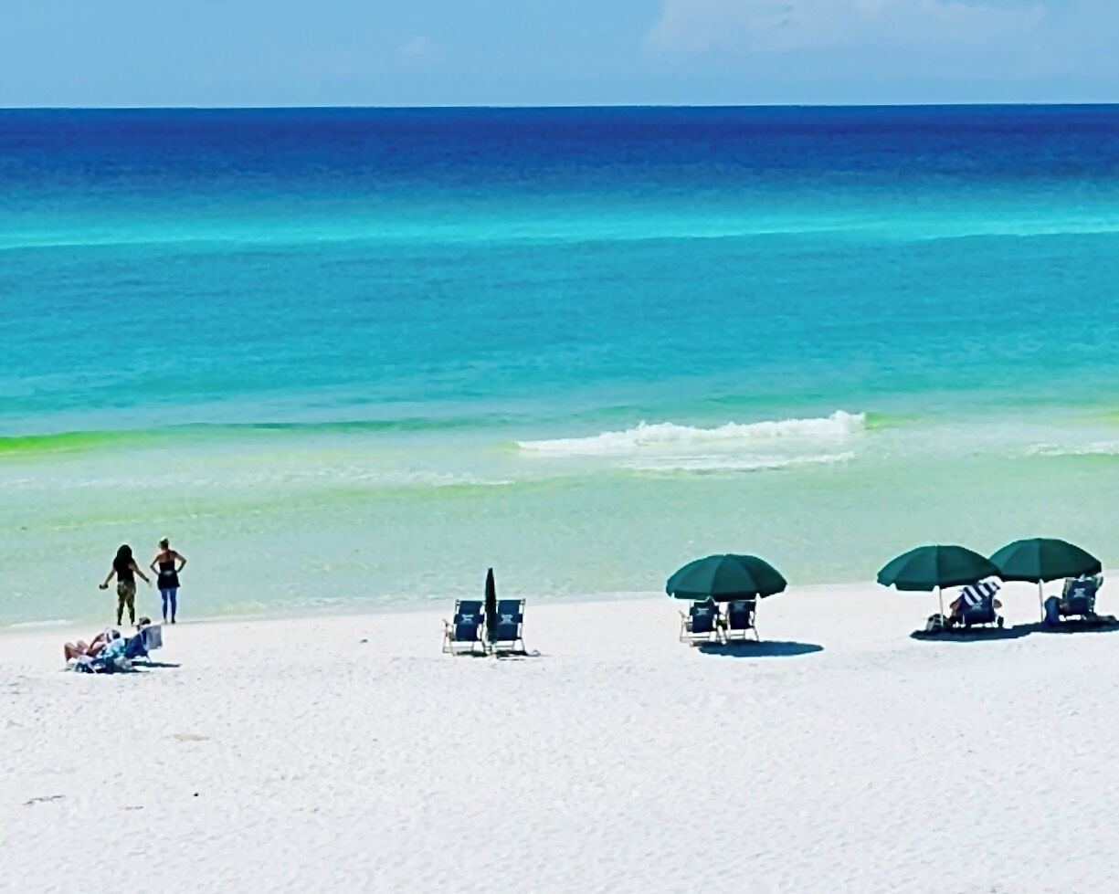On the beach, sun-loungers, beach towels