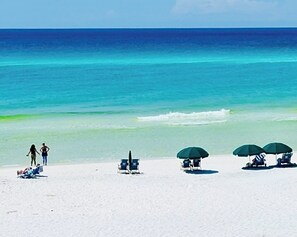 On the beach, sun loungers, beach towels