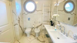 Bathtub, hair dryer, bidet, soap