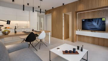 Design Apartment, 1 Bedroom, Balcony (2) | Living room | 43-inch flat-screen TV with satellite channels, TV