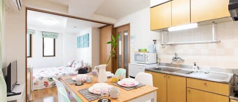 Apartment | Private kitchenette | Fridge, microwave, stovetop, coffee/tea maker