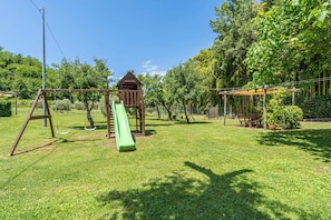 Children's area - Three-room country apartment with pool (Volterra)