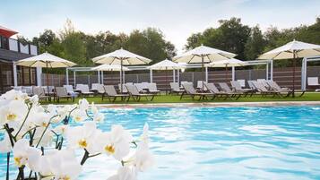 Indoor pool, outdoor pool, open 7:00 AM to 10:00 PM, pool umbrellas