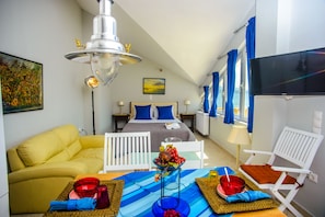 Deluxe Studio (Xenia) | Living area | Flat-screen TV - Xenia Ionis Luxury Concept Apartments (Kefalonia)