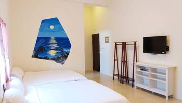 Family Room | Desk, blackout drapes, bed sheets