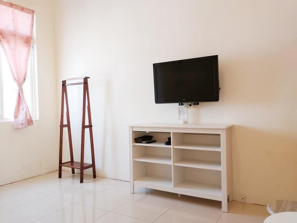 Desk, blackout drapes, bed sheets