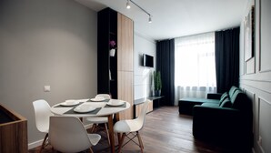 Standard Apartment | Living room | Flat-screen TV - Austrian Apart Hotel (Lviv)