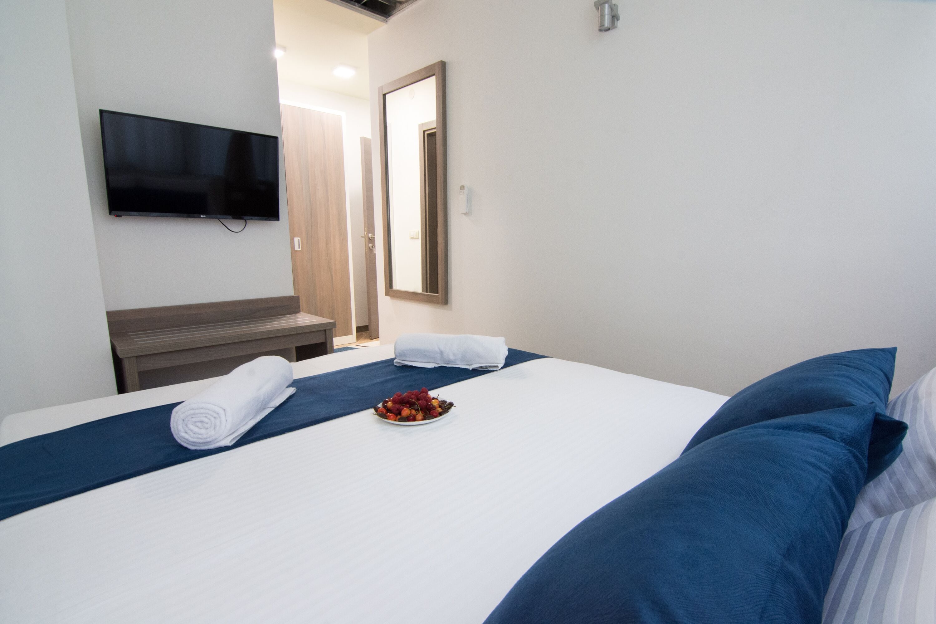 deluxe double room | premium bedding, minibar, in-room safe, desk