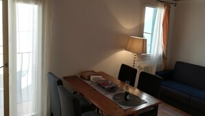 Suite, 1 Bedroom (Canal Grande) | Living area | TV - Casa Genoveffa (Venice)