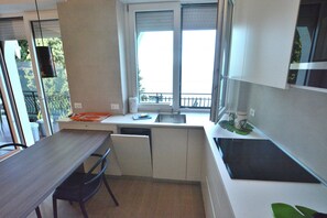 Apartment, 1 Bedroom | Private kitchen - Leonardo Walsh Apartment With Lake View (Torri del Benaco)