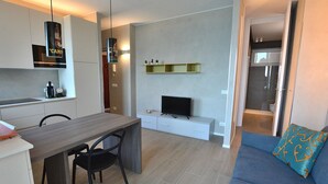 Apartment, 1 Bedroom | Living area | Flat-screen TV - Leonardo Walsh Apartment With Lake View (Torri del Benaco)