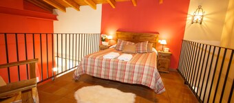 La Fragua is a beautiful little house with a gable roof built in stone and wood