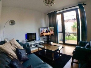 Lyxigt townhome | Vardagsrum | Platt-tv