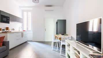 Apartment, 1 Bedroom | Living area | Flat-screen TV
