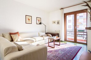 Apartment, 2 Bedrooms | Living area | Flat-screen TV, fireplace
