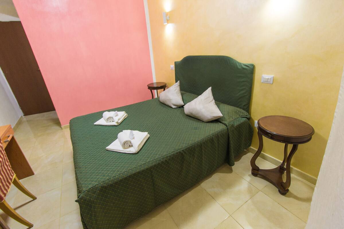 Desk, free WiFi, bed sheets