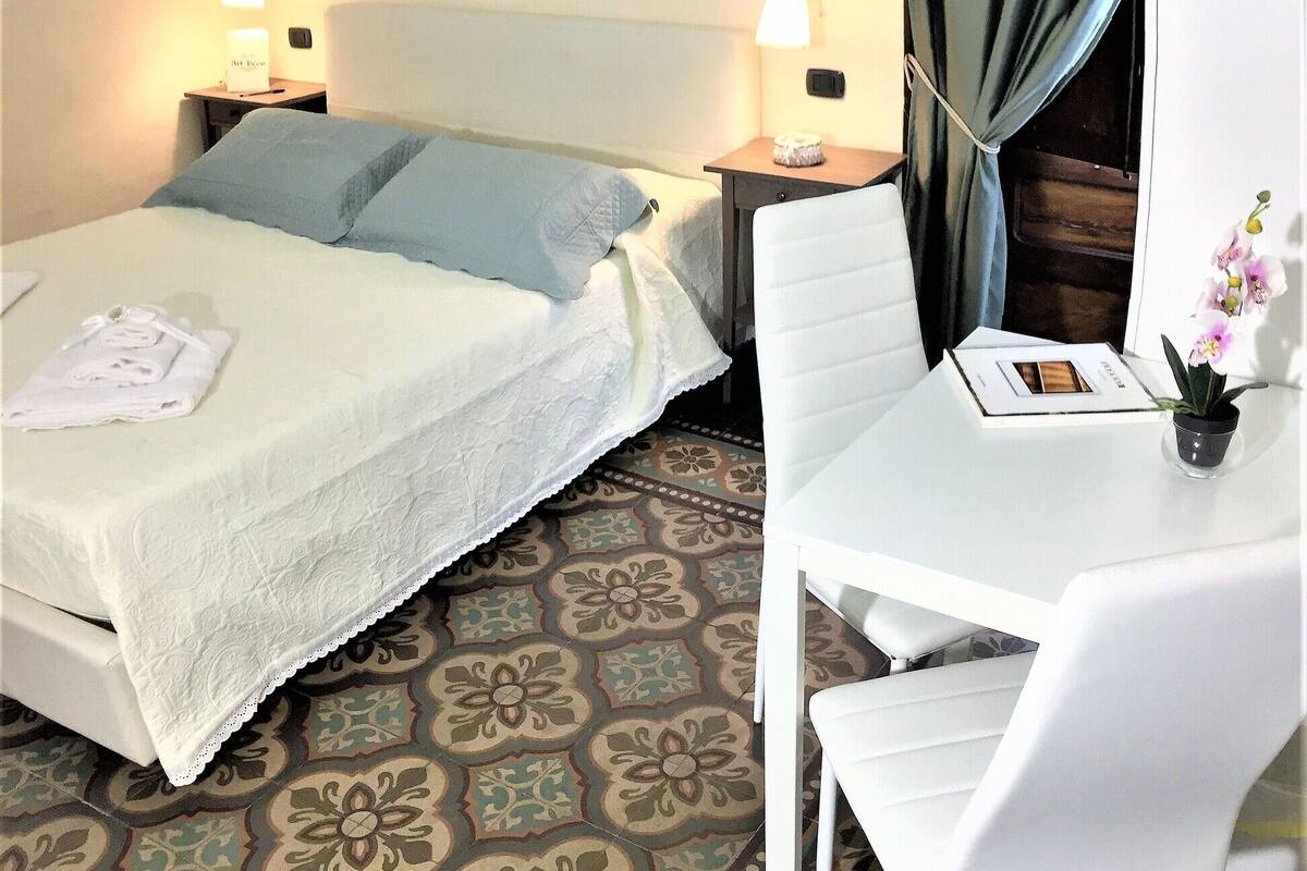 Family Quadruple Room, Balcony | In-room safe, blackout drapes, WiFi (free), bed sheets