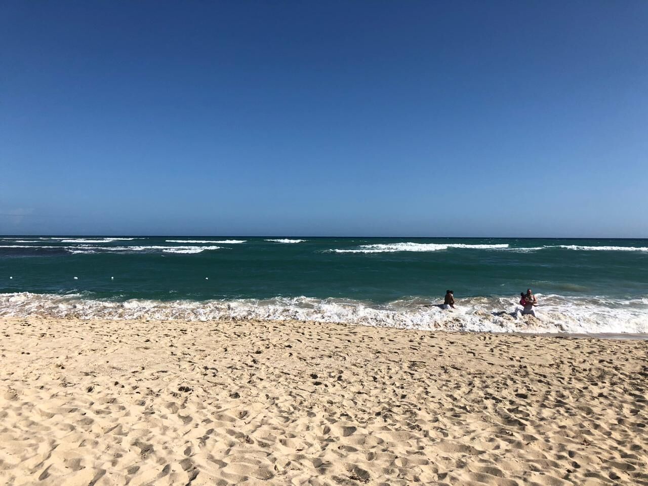 On the beach, sun-loungers