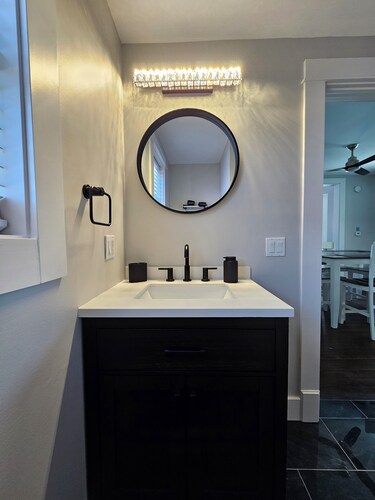 Beautifully redone,  fenced yard,  fire pit,  close to the lake
