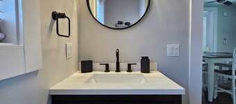 Beautifully redone,  fenced yard,  fire pit,  close to the lake
