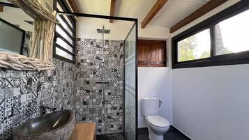 Shower, hair dryer, towels, toilet paper