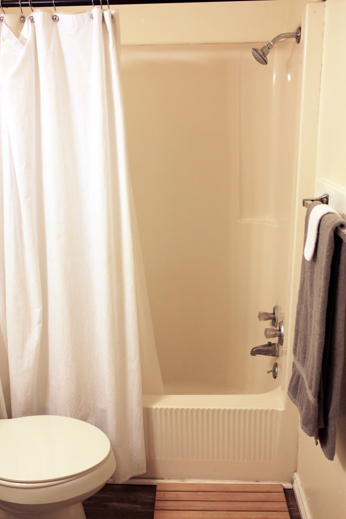 Bathtub, hair dryer, towels