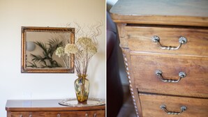 A wooden dresser with multiple drawers and metal handles. - Agriturismo Il Mondo (Parma)