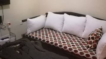 Apartment, 2 Bedrooms | Living room | 32-inch flat-screen TV with cable channels, TV