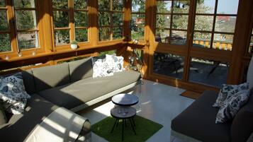 Superior Apartment (incl. EUR 120 Cleaning fee) | Living area | 32-inch flat-screen TV with satellite channels, TV, DVD player