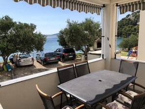Apartamento, 2 quartos, vista para o mar | Terraço/pátio