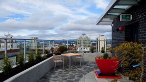 Outdoor dining - Sunset Place-Deluxe One Bedroom Condo in the Escher Building, Sunset Views and Beyond (Victoria)