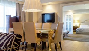 Presidential Suite, 1 King Bed | Living area | 55-inch flat-screen TV with digital channels, TV, Netflix
