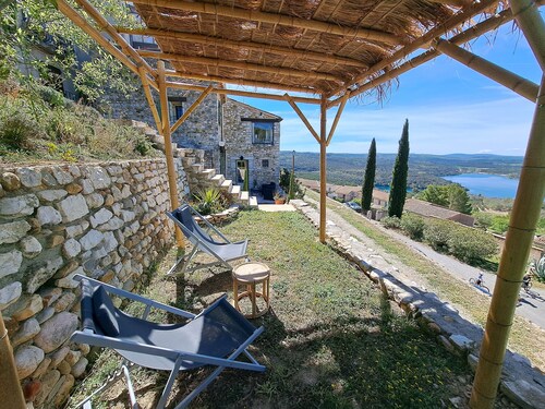 Stone house with terrace and garden facing the Lake