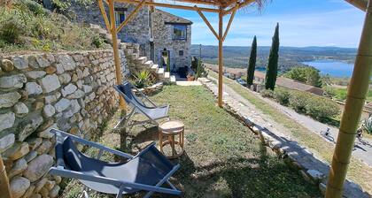 Stone house with terrace and garden facing the Lake
