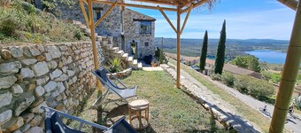 Stone house with terrace and garden facing the Lake