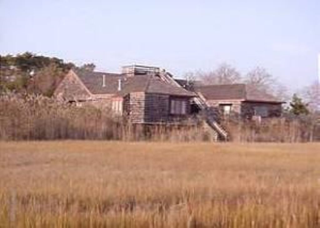 NESTLED ALONG BANKS OF ASSATEAGUE BAY OVERLOOKING THE SALT MARSHES!