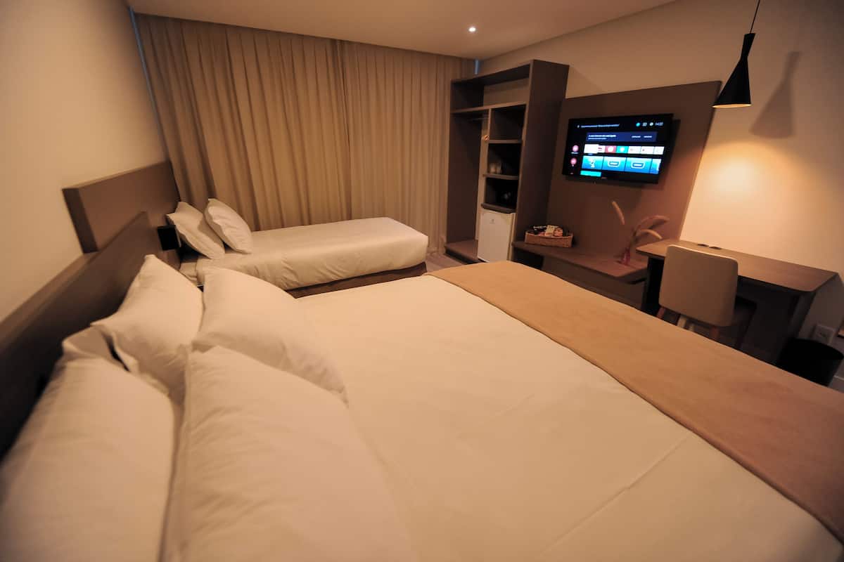 Family Room | Hypo-allergenic bedding, minibar, in-room safe, individually decorated