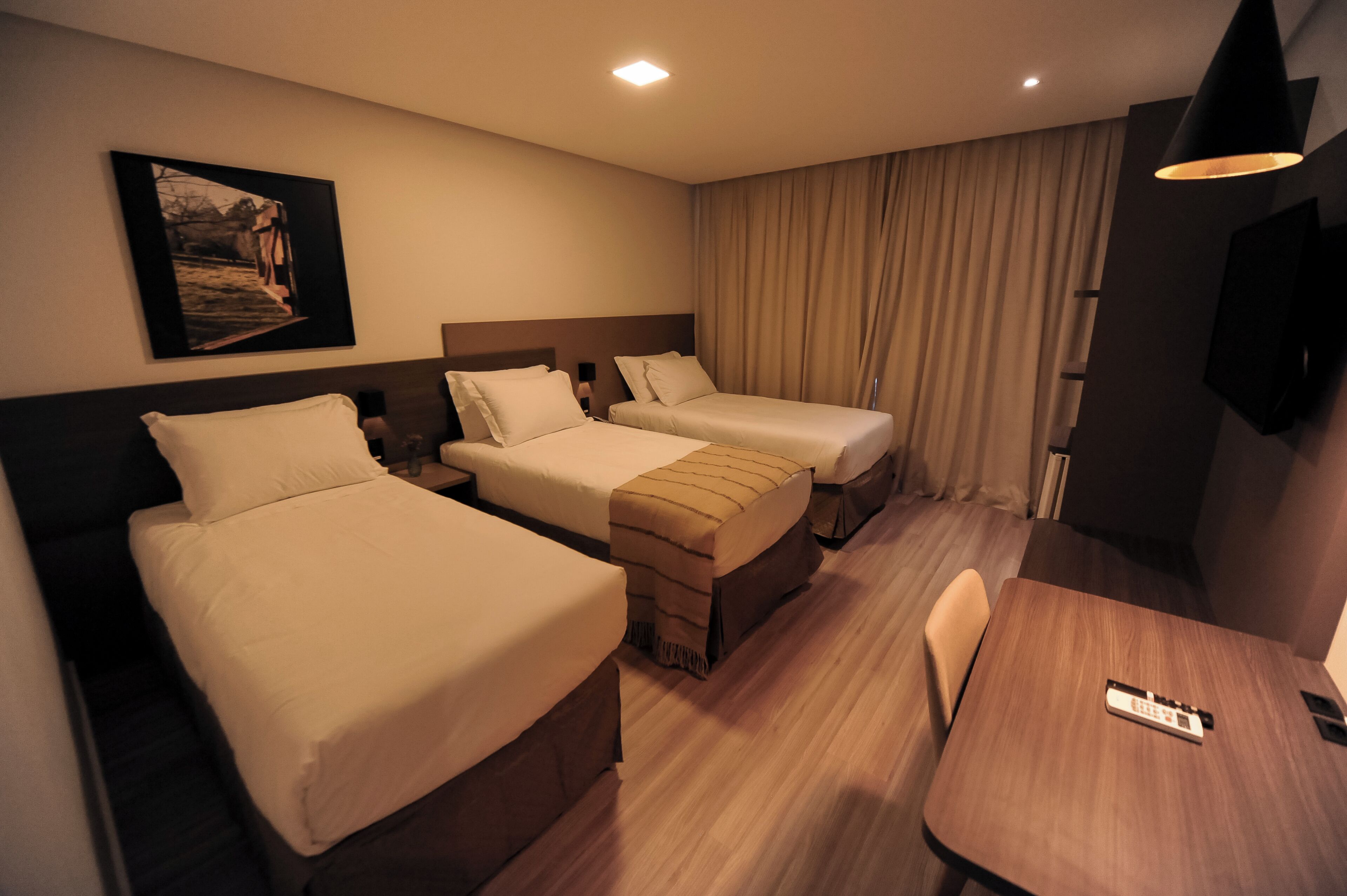 Triple Room | Hypo-allergenic bedding, minibar, in-room safe, individually decorated