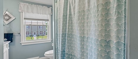 Combined shower/bathtub, hair dryer