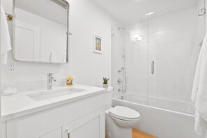Hair dryer, towels, soap, shampoo