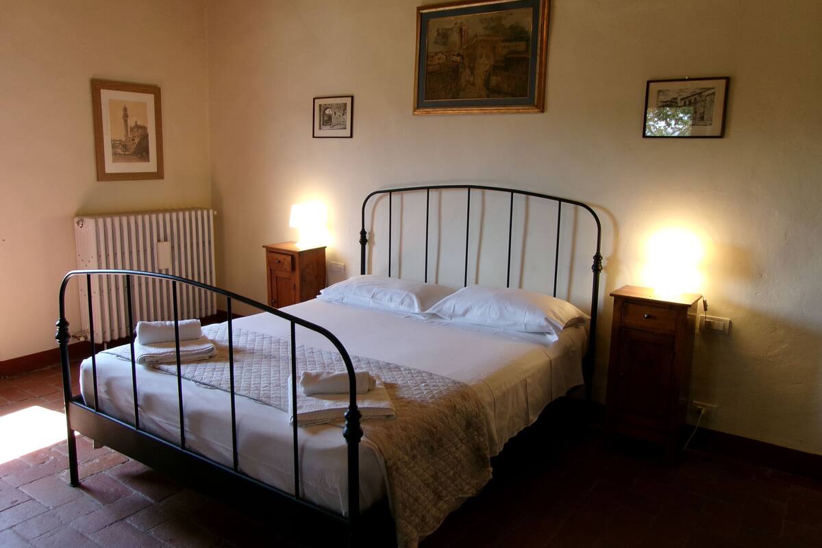 Hypo-allergenic bedding, desk, laptop workspace, blackout curtains