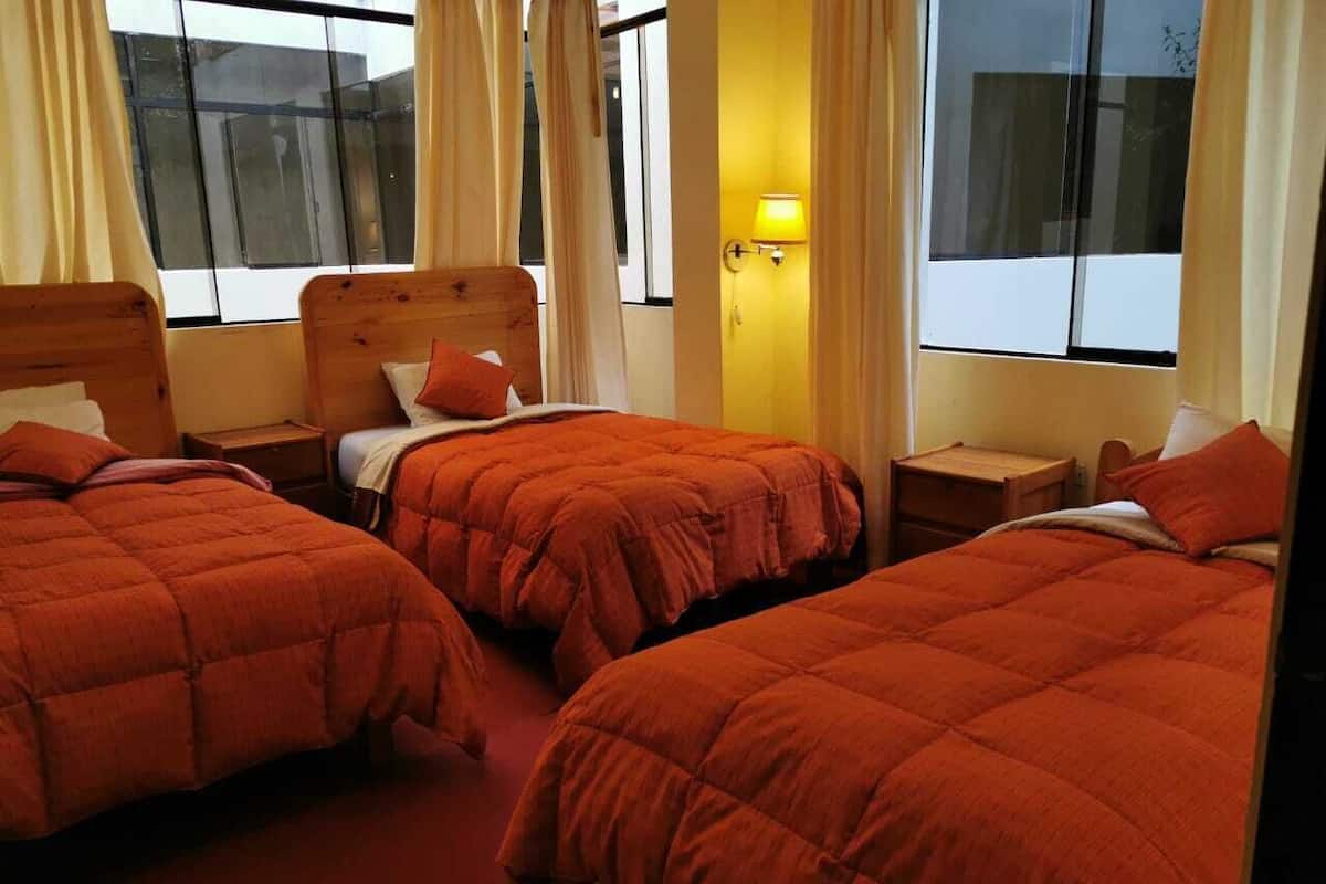 Quadruple Room | Iron/ironing board (on request), bed sheets