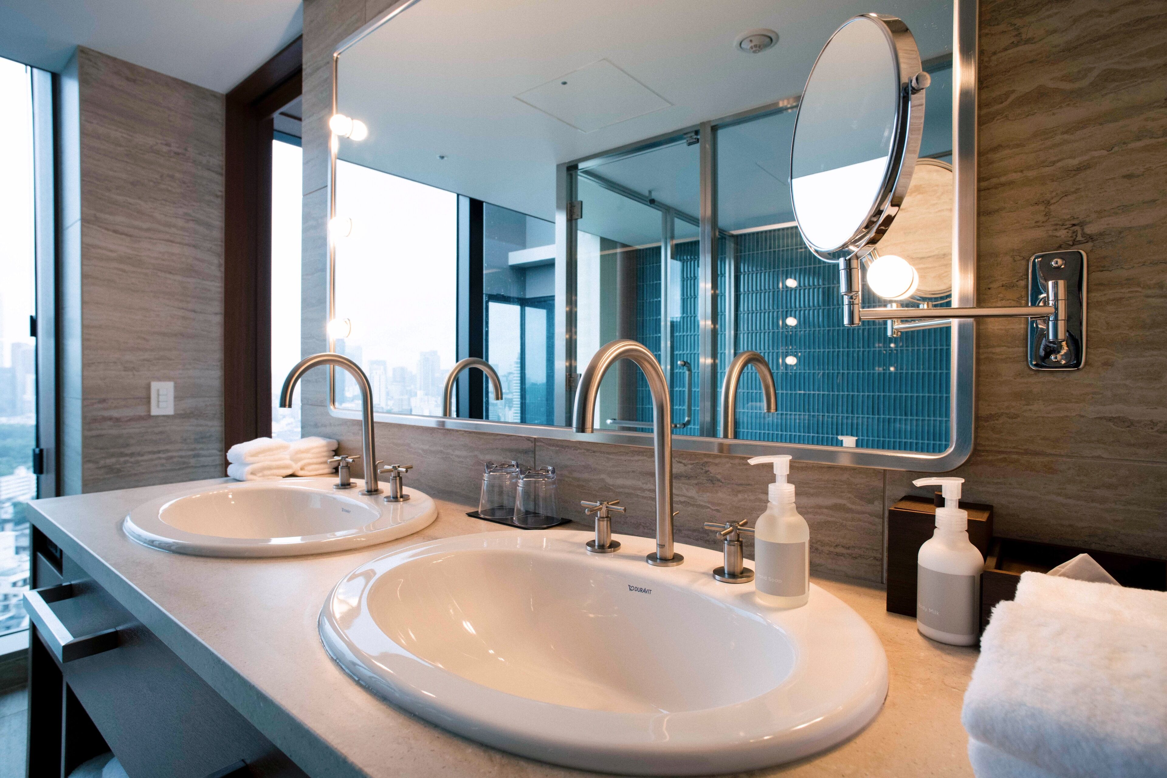 aoyama suite king with city view, non smoking | bathroom | combined shower/bathtub, rainfall showerhead, designer toiletries
