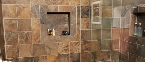 Combined shower/bathtub, hair dryer, towels, soap
