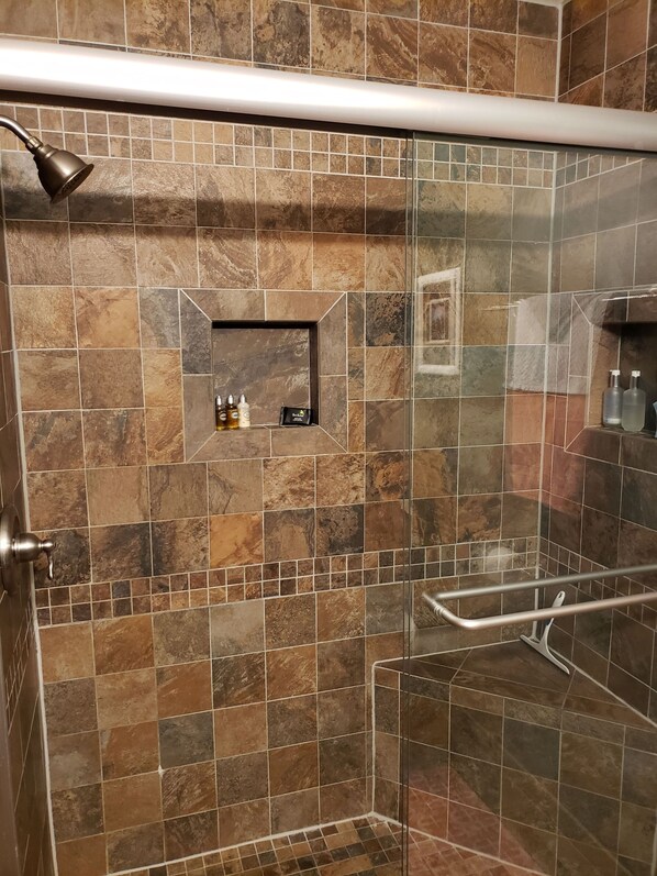 Combined shower/tub, hair dryer, towels, soap