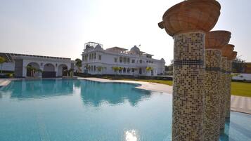 Outdoor pool, open 7:00 AM to 9:00 PM, sun loungers