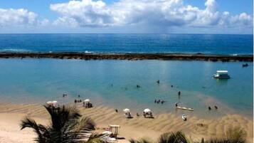 Beach nearby, white sand, beach bar