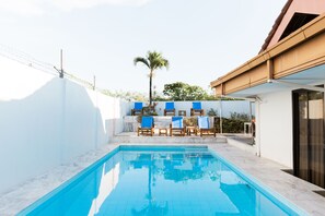 Outdoor pool, pool umbrellas, sun loungers