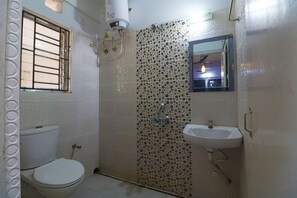 Habitació Deluxe | Bany | Dutxa i tovalloles 